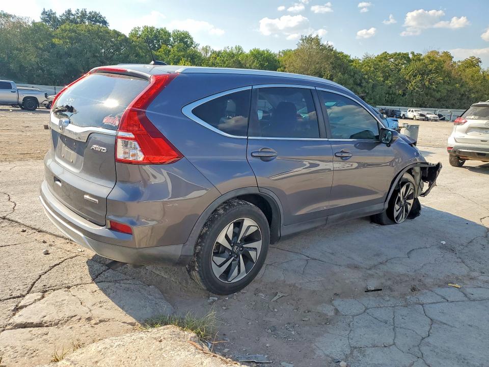 Photo 3 from auction – 2015 HONDA CR-V with VIN 5J6RM4H92FL105324