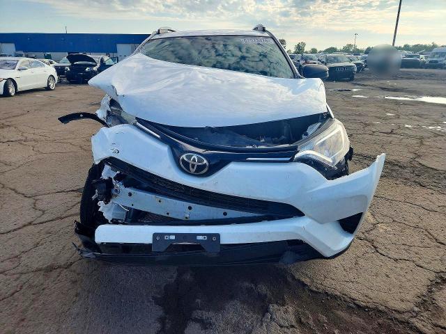 Photo 5 from auction – 2018 TOYOTA RAV4 with VIN 2T3BFREV3JW757620