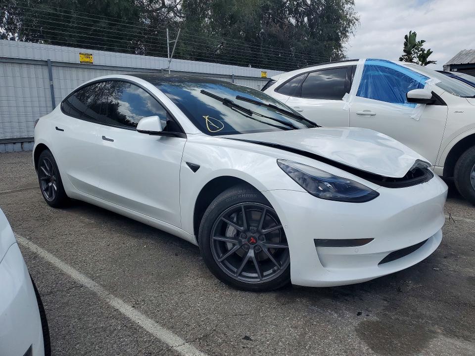 Photo 4 from auction – 2021 TESLA MODEL 3 with VIN 5YJ3E1EA2MF002782