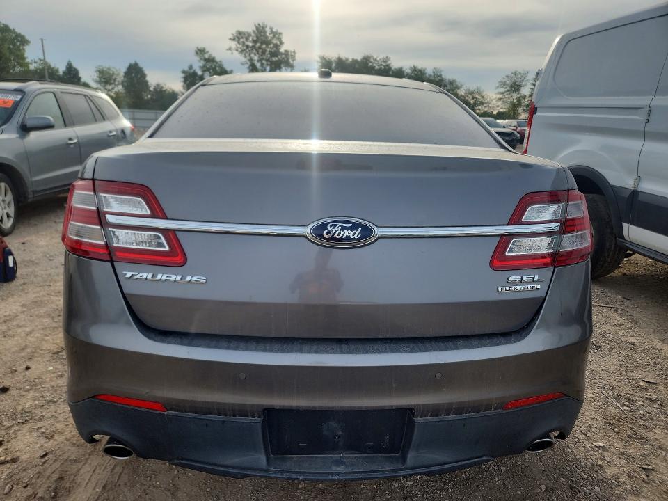 Photo 6 from auction – 2013 FORD TAURUS with VIN 1FAHP2E8XDG156185