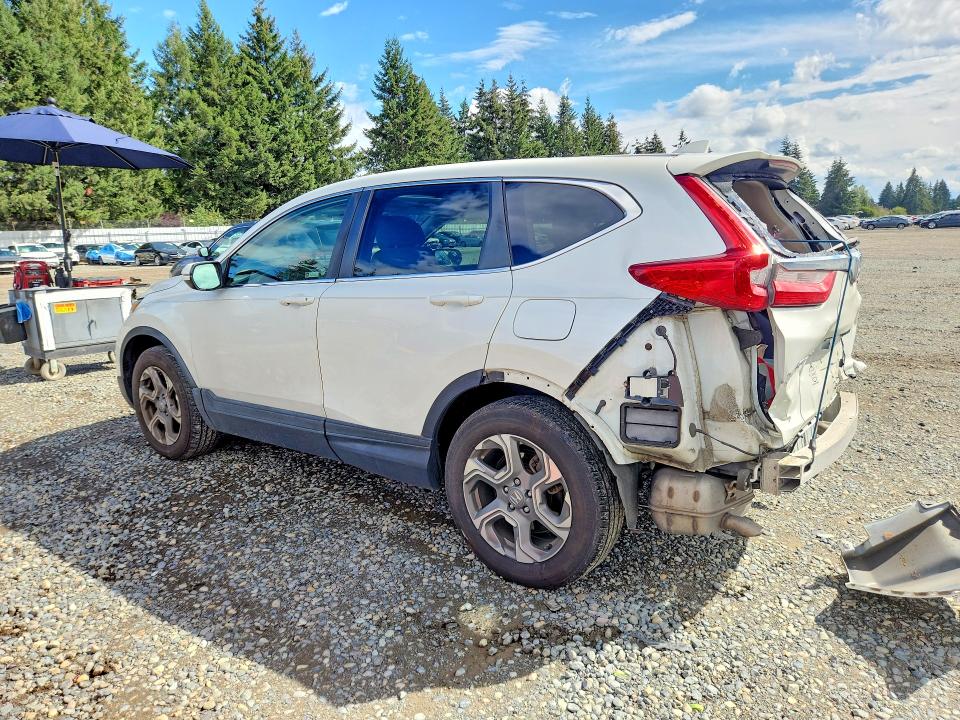 Photo 2 from auction – 2018 HONDA CR-V with VIN 2HKRW2H52JH693532