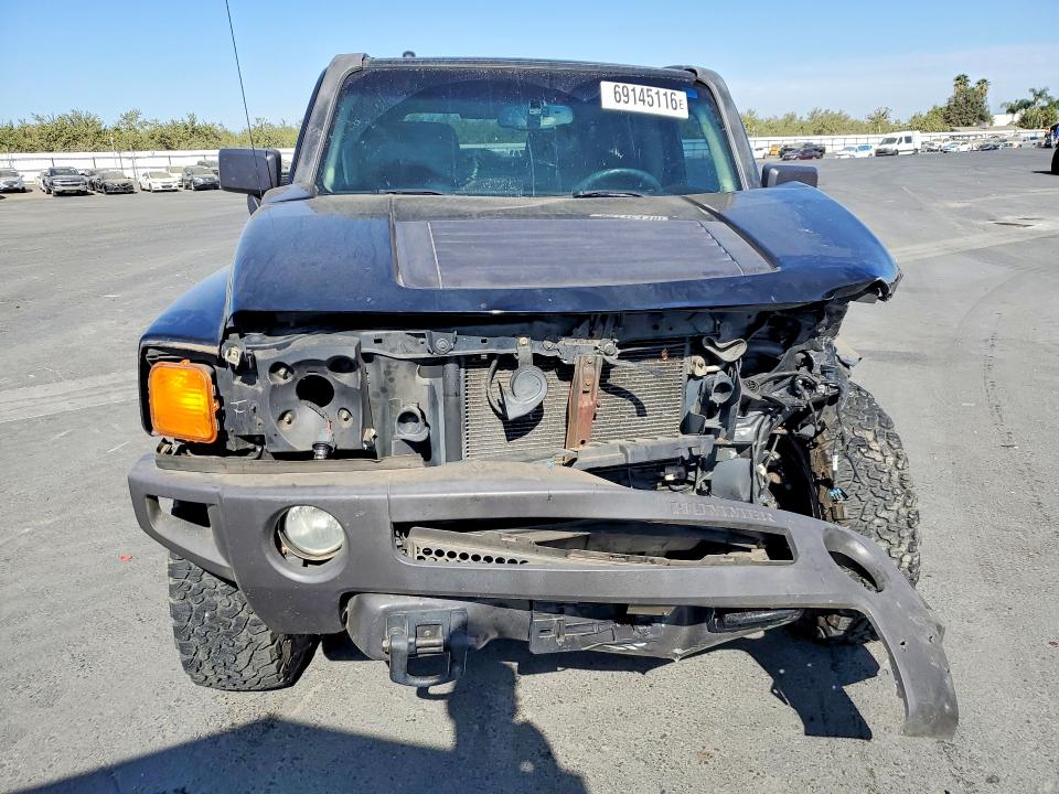 Photo 5 from auction – 2006 HUMMER H3 with VIN 5GTDN136168165924