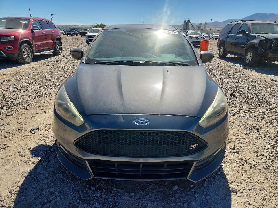Фото 5 с аукциона – 2016 FORD FOCUS с VIN 1FADP3L95GL310636