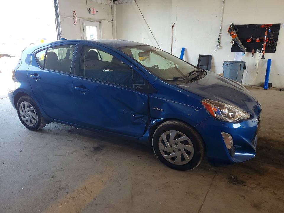 Photo 4 from auction – 2015 TOYOTA PRIUS C with VIN JTDKDTB31F1106191