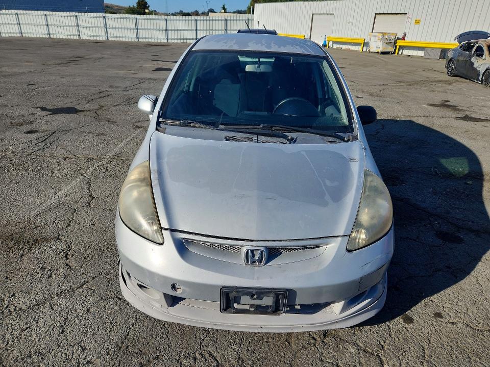 Photo 5 from auction – 2007 HONDA FIT with VIN JHMGD38697S004039