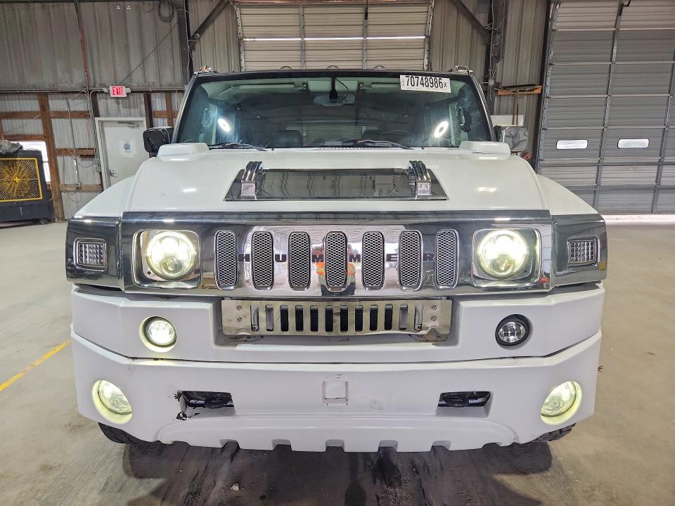 Снимка 5 от търг – 2003 HUMMER H2 с VIN 5GRGN23U93H111998