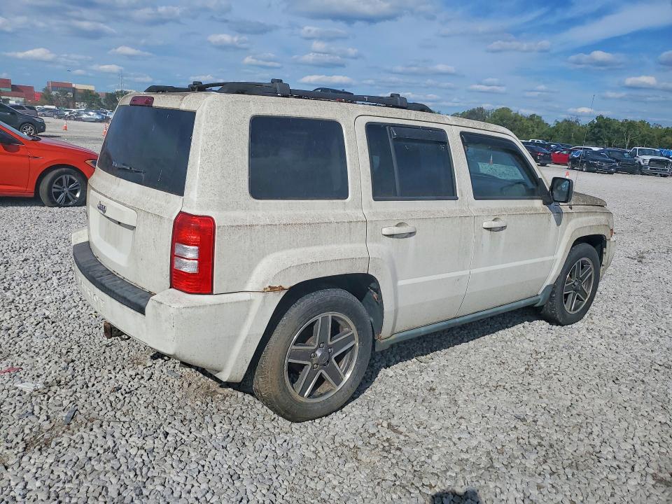 Снимка 3 от търг – 2010 JEEP PATRIOT с VIN 1J4NF2GB6AD572931