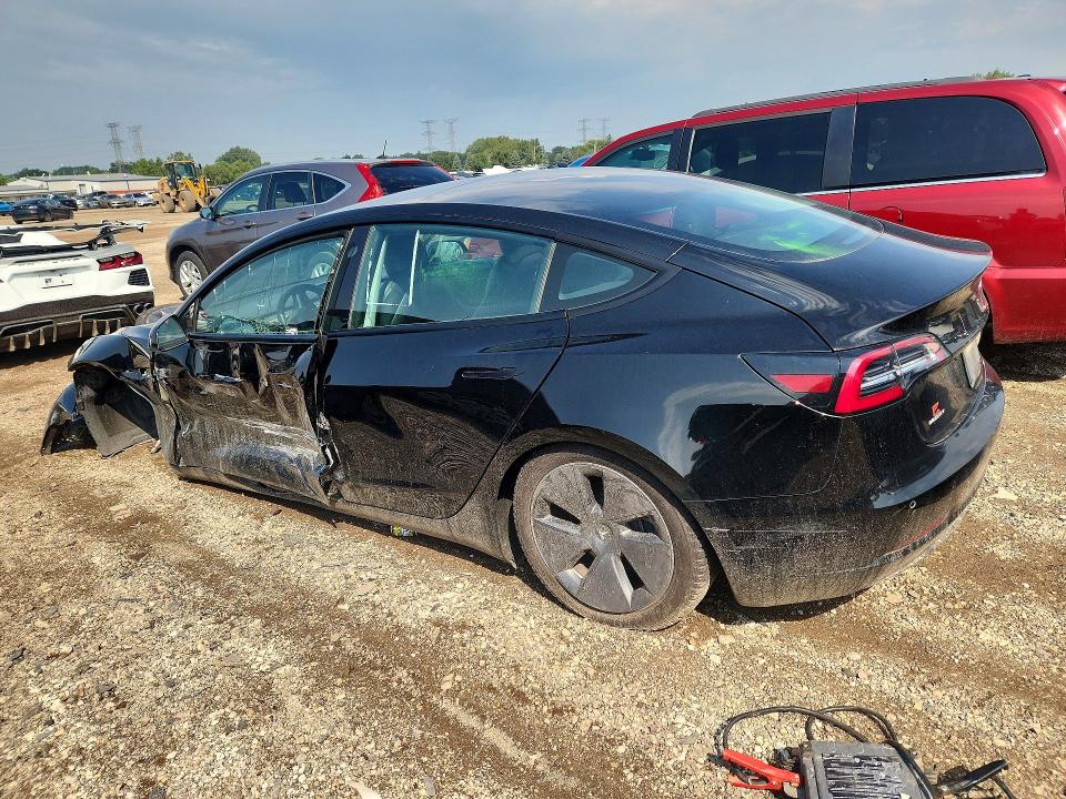 Photo 2 from auction – 2021 TESLA MODEL 3 with VIN 5YJ3E1EB9MF869511