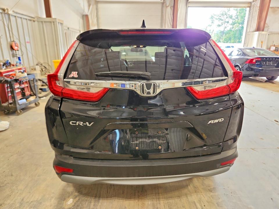 Photo 6 from auction – 2018 HONDA CR-V with VIN 7FARW2H88JE080120
