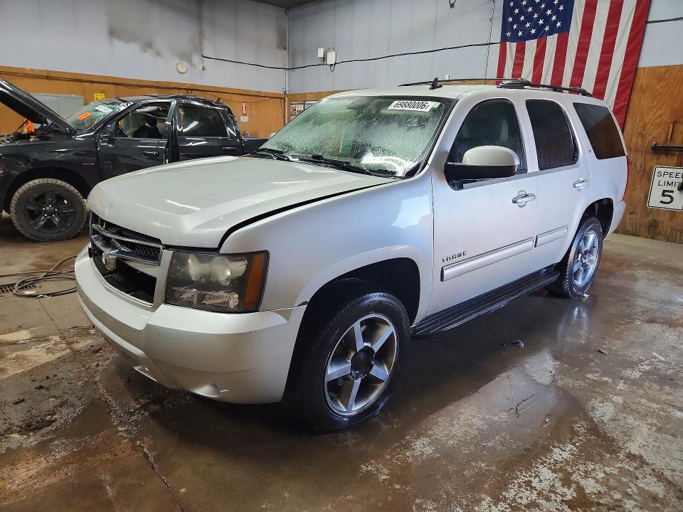 CHEVROLET TAHOE 2011 с VIN 1GNSKBE03BR214462 - Снимка от търг