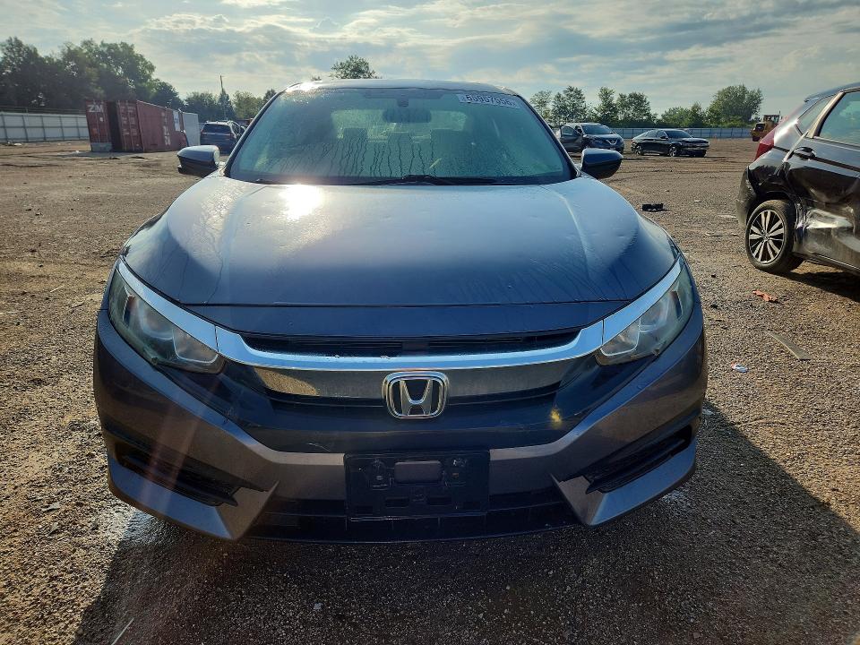 Photo 5 from auction – 2018 HONDA CIVIC with VIN 19XFC2F77JE033443