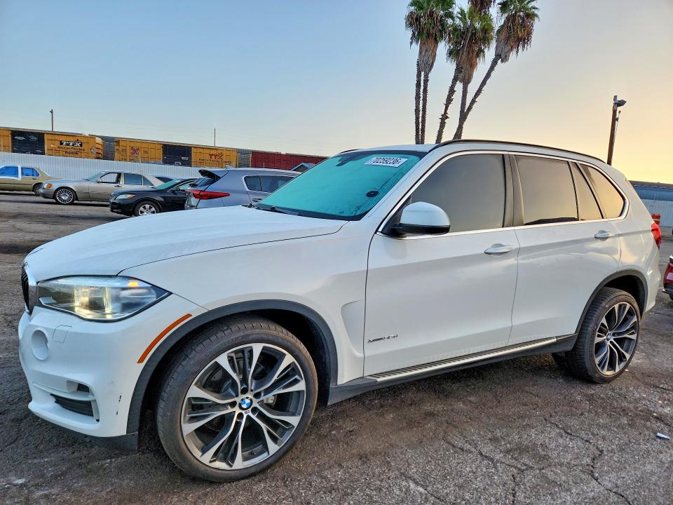 BMW X5 2015 with VIN 5UXKS4C56F0N05663 - Photo from auction