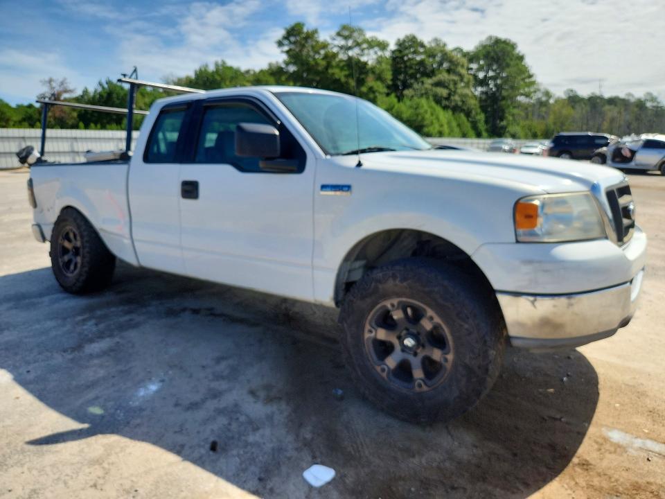 Photo 4 from auction – 2004 FORD F150 with VIN 1FTRX12W14NB19887