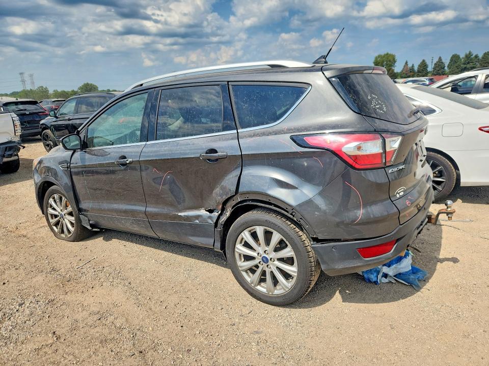 Photo 2 from auction – 2018 FORD ESCAPE with VIN 1FMCU9J98JUC20205
