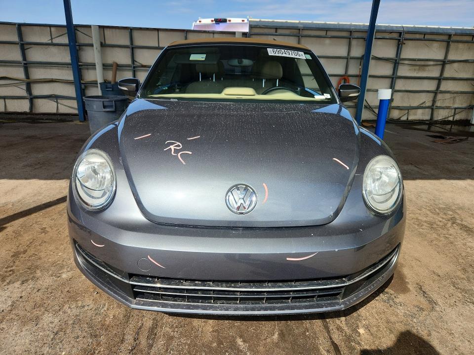 Photo 5 from auction – 2013 VOLKSWAGEN BEETLE with VIN 3VW5L7AT7DM832045