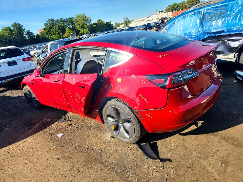Foto 2 de la subasta – 2018 TESLA MODEL 3 con VIN 5YJ3E1EB7JF075117