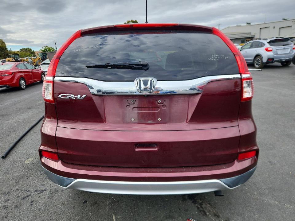 Photo 6 from auction – 2016 HONDA CR-V with VIN 2HKRM3H51GH553881