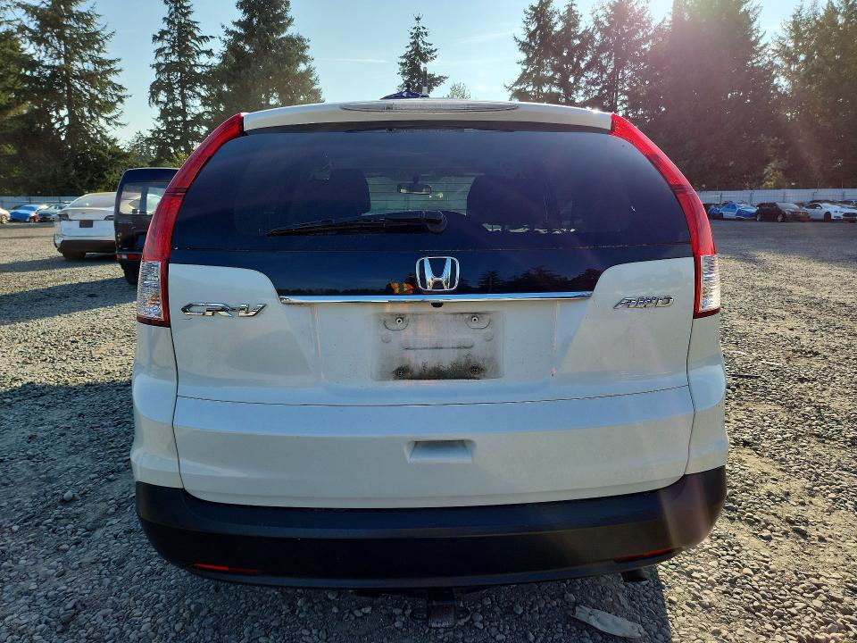 Photo 6 from auction – 2012 HONDA CR-V with VIN 5J6RM4H59CL039671