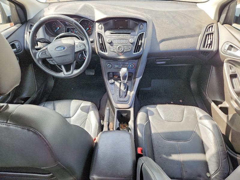 Снимка 8 от търг – 2016 FORD FOCUS с VIN 1FADP3F21GL223654