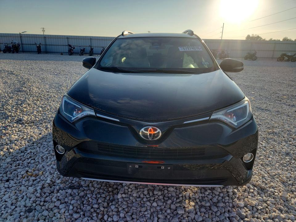 Photo 5 from auction – 2017 TOYOTA RAV4 with VIN 2T3RFREV7HW650210