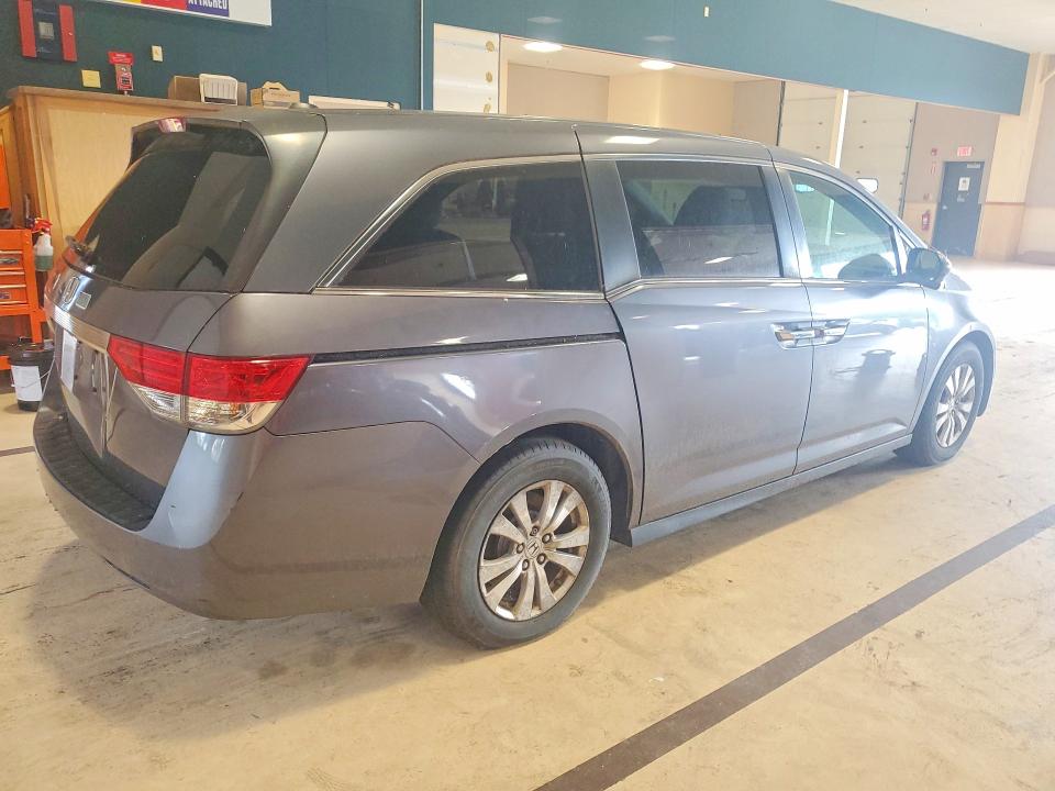 Photo 3 from auction – 2016 HONDA ODYSSEY with VIN 5FNRL5H60GB093571
