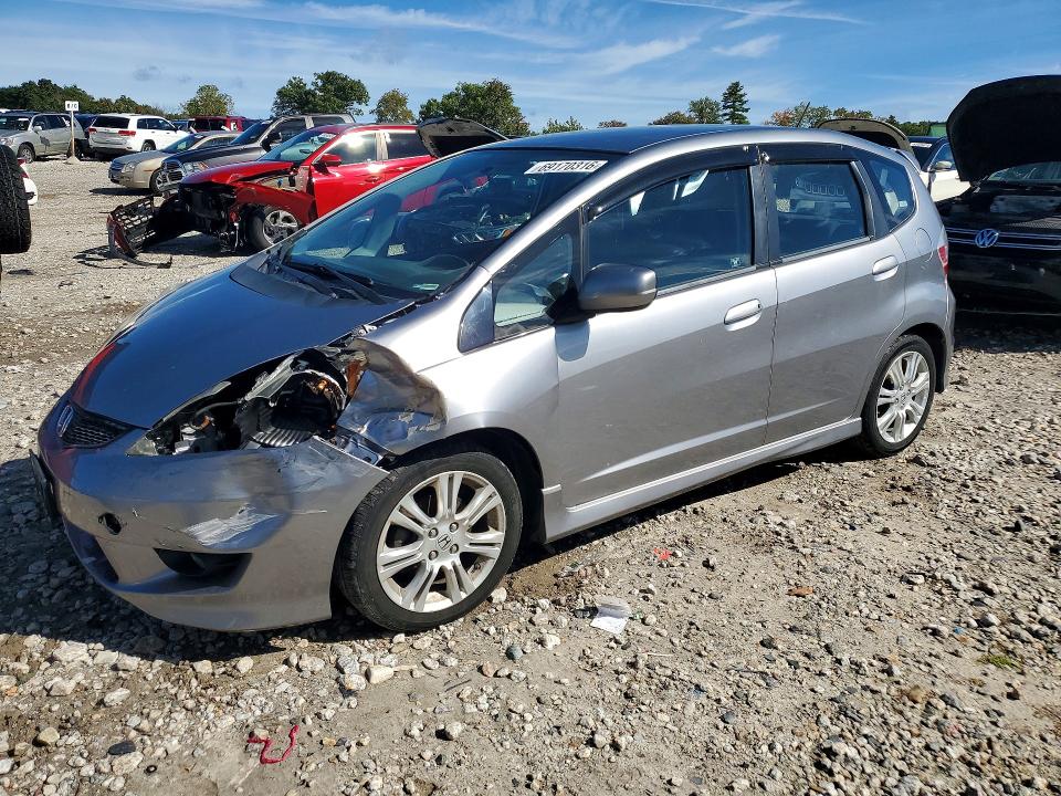 HONDA FIT 2009 с VIN JHMGE88419S054400 - Снимка от търг