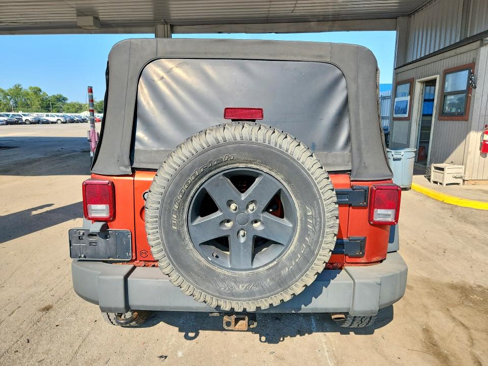 Photo 6 from auction – 2009 JEEP WRANGLER UNLIMITED with VIN 1J4GA691X9L749677