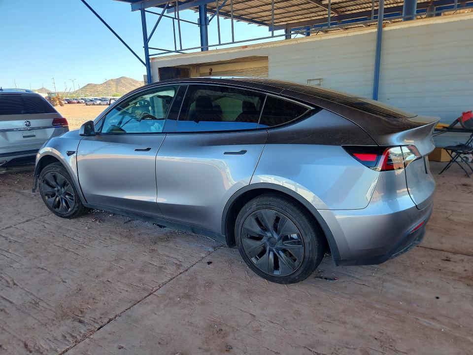 Снимка 2 от търг – 2025 TESLA MODEL Y с VIN 7SAYGDED5SF320164