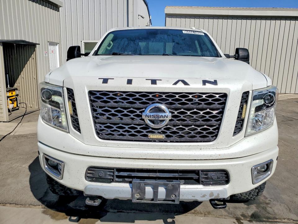 Снимка 5 от търг – 2019 NISSAN TITAN XD с VIN 1N6BA1F47KN520365