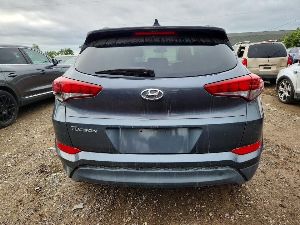 Снимка 6 от търг – 2018 HYUNDAI TUCSON с VIN KM8J33A49JU617238