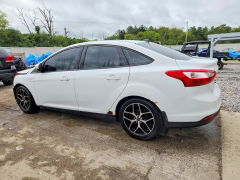 Photo 2 from auction – 2014 FORD FOCUS with VIN 1FADP3F26EL335086