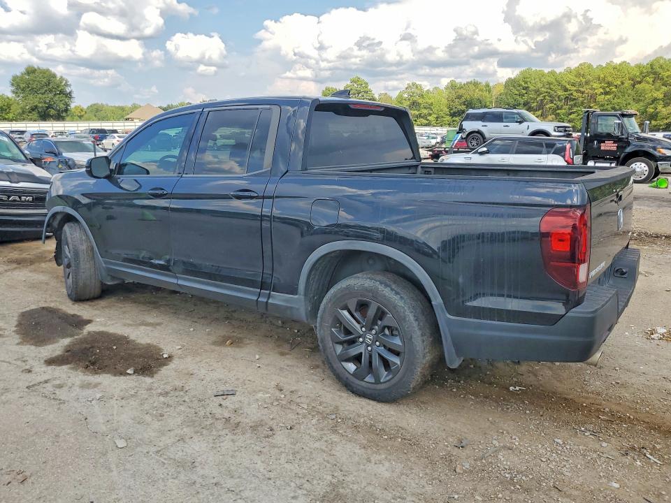 Photo 2 from auction – 2023 HONDA RIDGELINE with VIN 5FPYK3F12PB048780