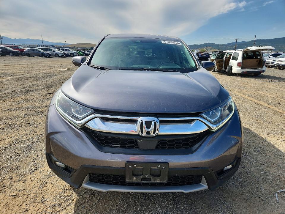 Photo 5 from auction – 2018 HONDA CR-V with VIN 2HKRW2H87JH670922