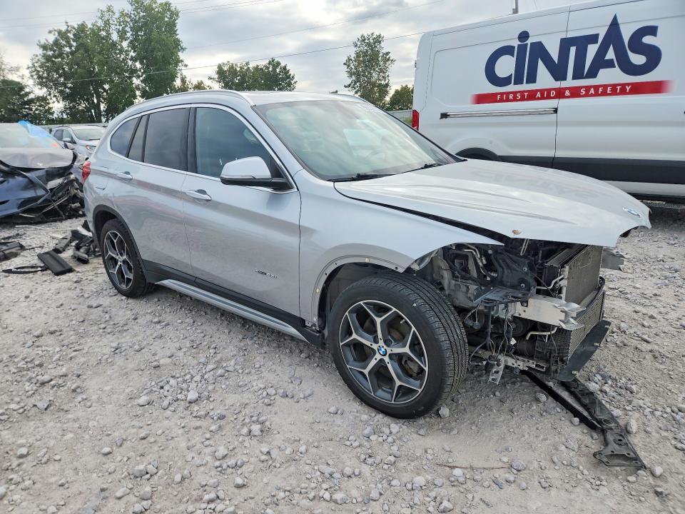 Photo 4 from auction – 2016 BMW X1 with VIN WBXHT3C30G5E54382