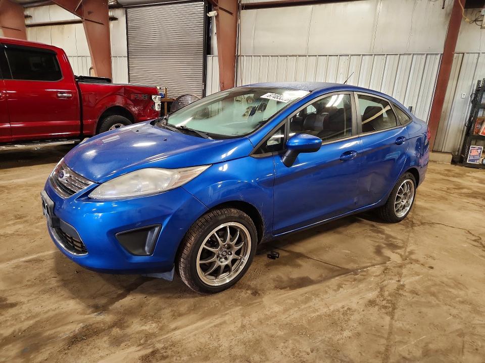 FORD FIESTA 2011 with VIN 3FADP4BJ7BM143222 - Photo from auction