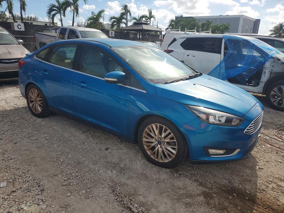 Photo 4 from auction – 2015 FORD FOCUS with VIN 1FADP3J26FL304509