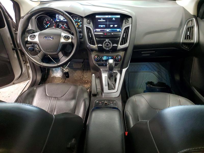 Снимка 8 от търг – 2014 FORD FOCUS с VIN 1FADP3N28EL257251