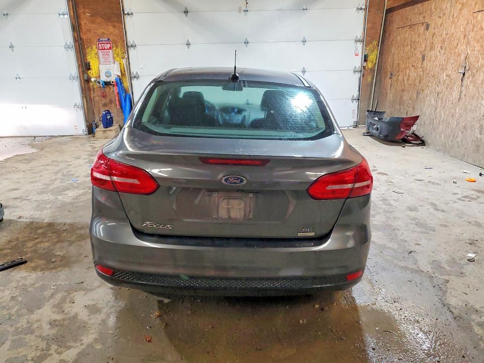 Снимка 6 от търг – 2018 FORD FOCUS с VIN 1FADP3FE1JL301223