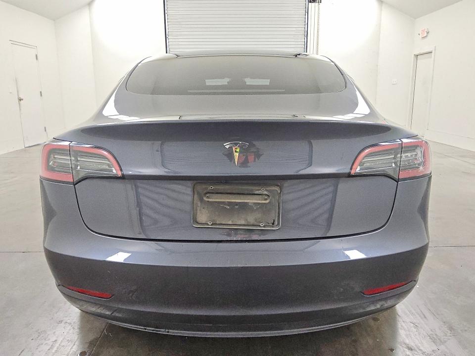 Снимка 6 от търг – 2023 TESLA MODEL 3 с VIN 5YJ3E1EA1PF696868