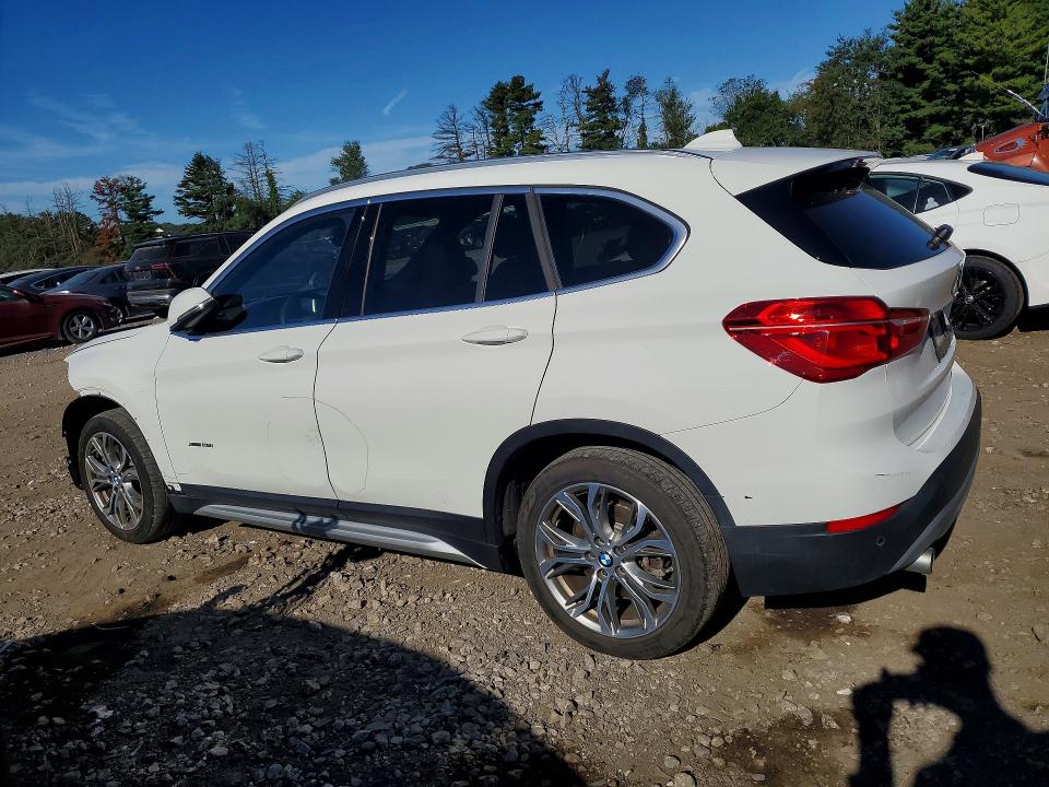 Photo 2 from auction – 2017 BMW X1 with VIN WBXHT3Z31H4A57486