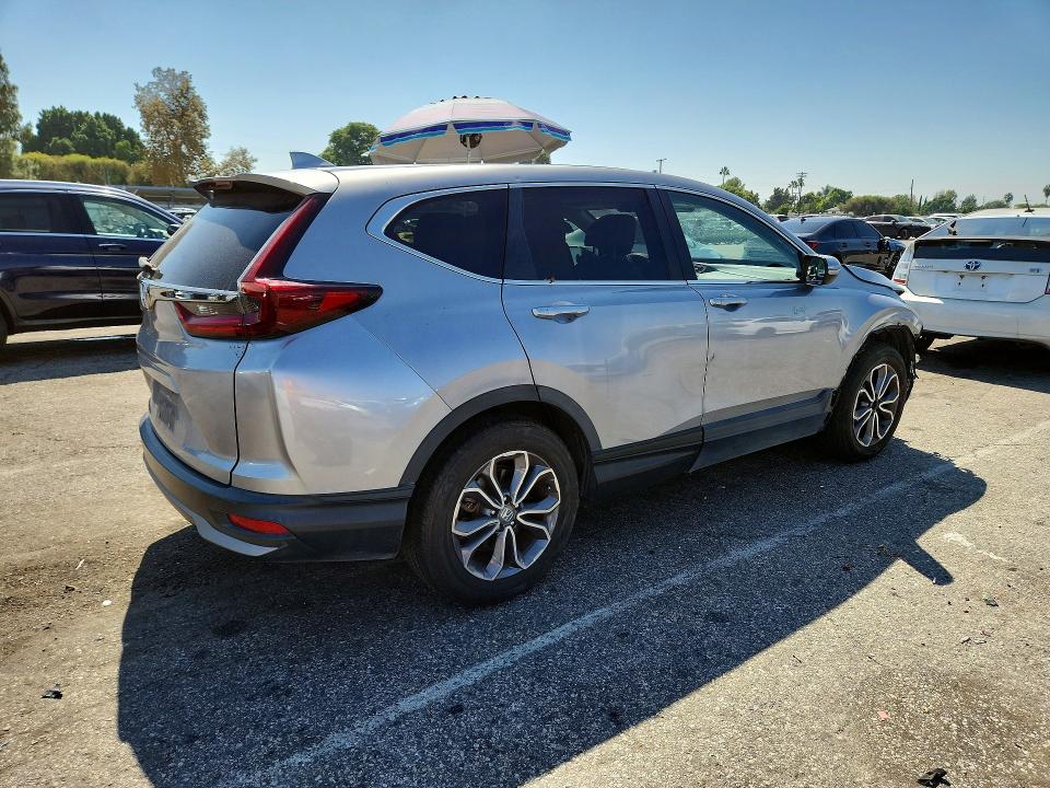 Photo 3 from auction – 2021 HONDA CR V with VIN 7FARW1H87ME021588