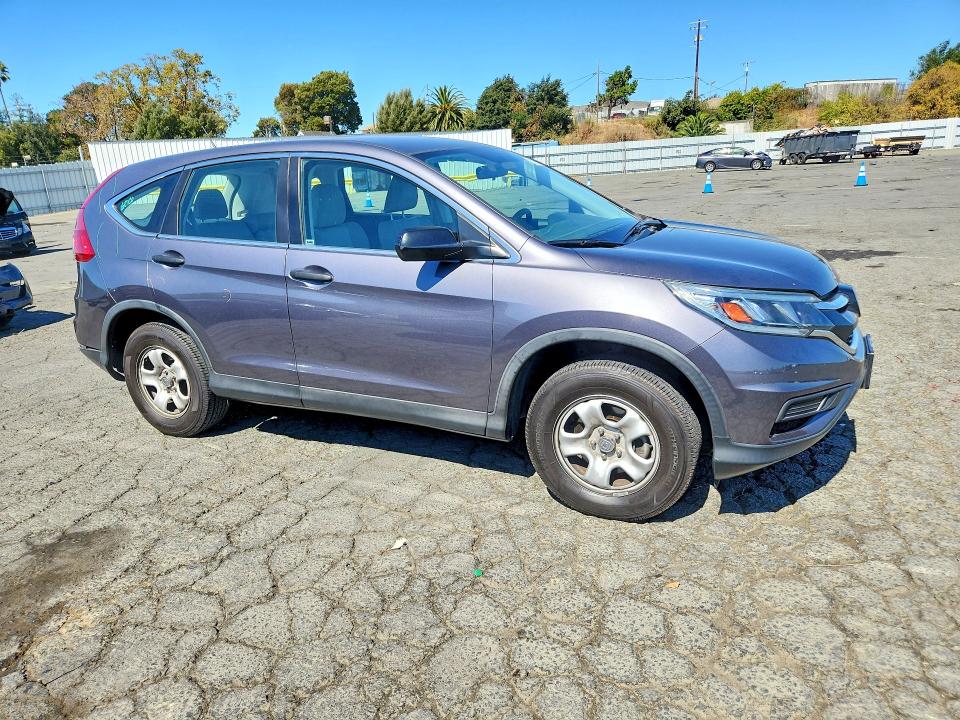Photo 4 from auction – 2015 HONDA CR-V with VIN 3CZRM3H32FG717655