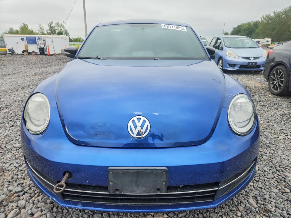 Photo 5 from auction – 2012 VOLKSWAGEN BEETLE with VIN 3VWVA7AT7CM656764