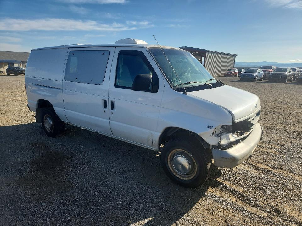 Photo 4 from auction – 1999 FORD ECONOLINE with VIN 1FTPE24L1XHC28147