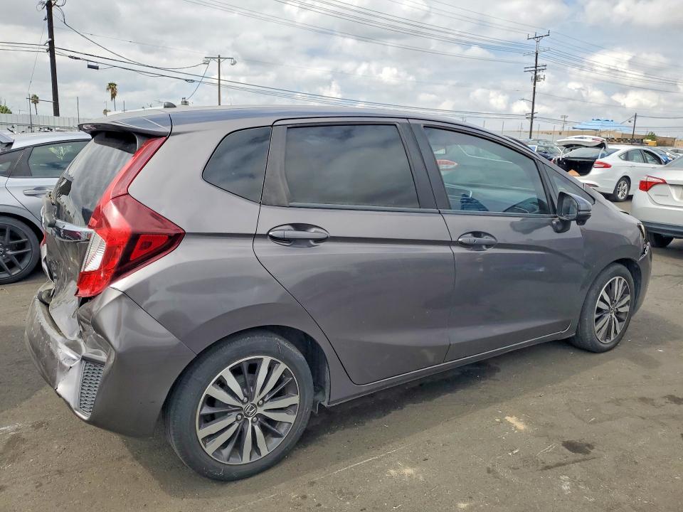 Снимка 3 от търг – 2016 HONDA FIT с VIN JHMGK5H76GX036816