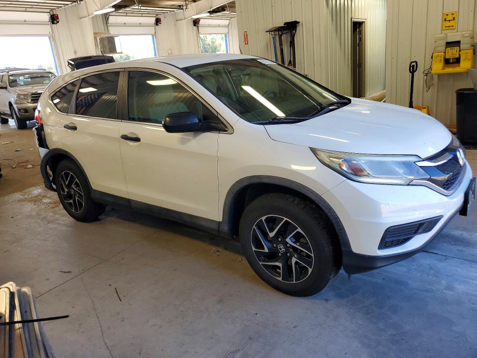 Photo 4 from auction – 2016 HONDA CR-V with VIN 5J6RM3H48GL008029