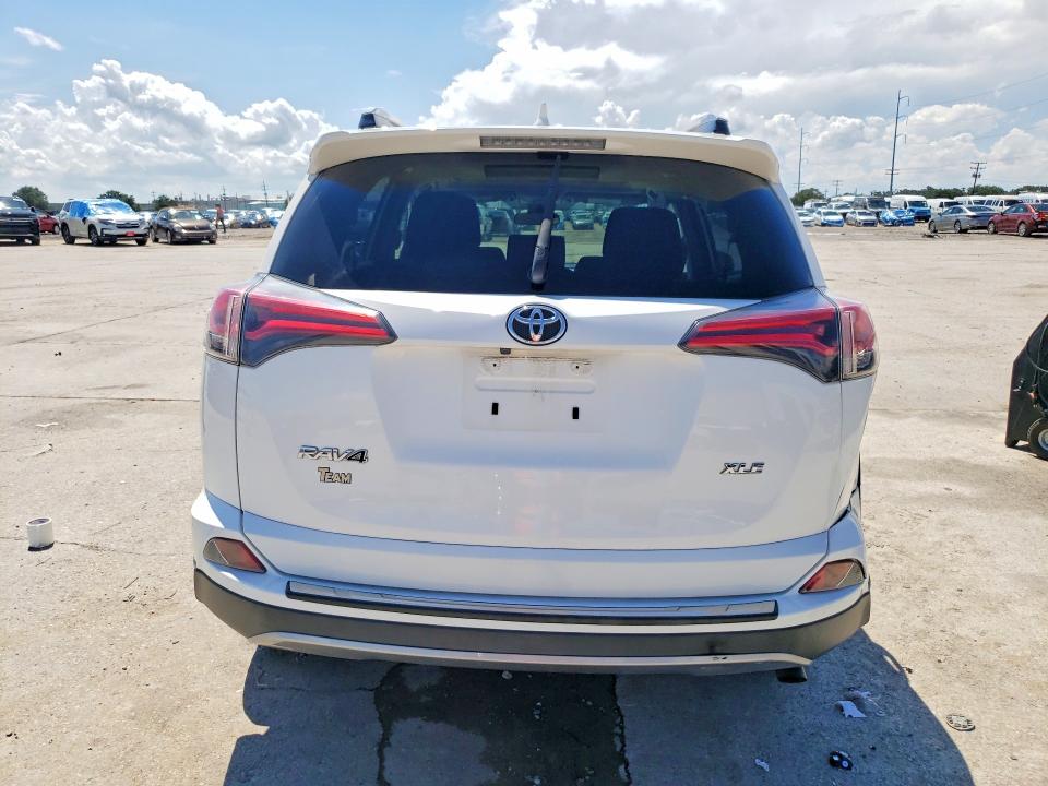 Photo 6 from auction – 2017 TOYOTA RAV4 with VIN JTMWFREVXHJ710403