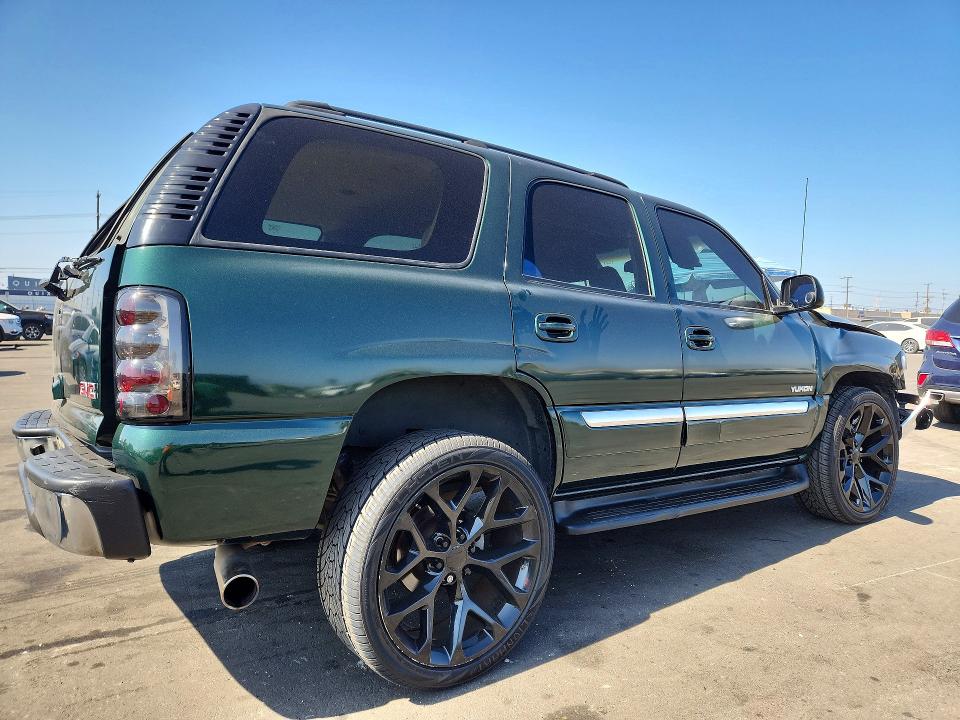 Снимка 3 от търг – 2003 GMC YUKON с VIN 1GKEC13VX3J301145