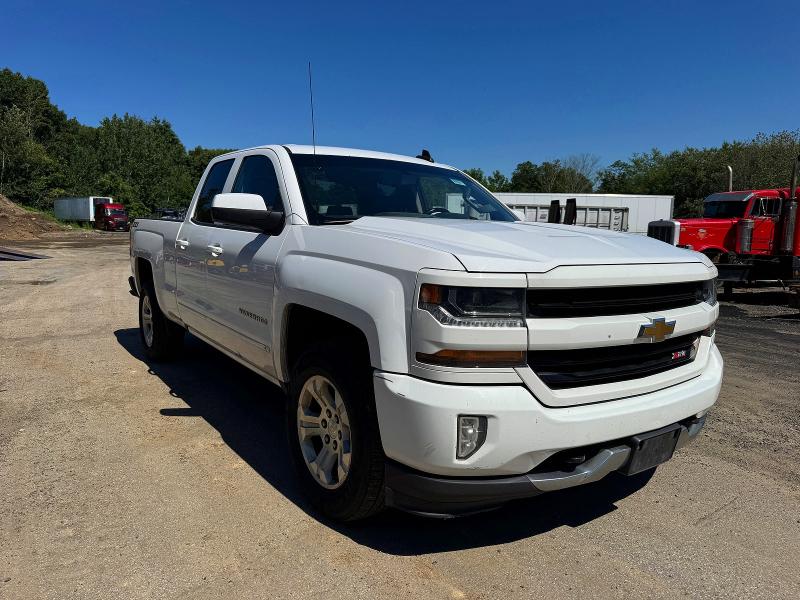 CHEVROLET SILVERADO 2018 with VIN 1GCVKREC3JZ211889 - Photo from auction