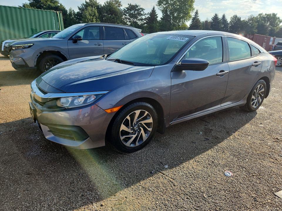 HONDA CIVIC 2018 with VIN 19XFC2F77JE033443 - Photo from auction